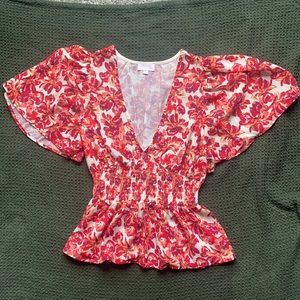 Pink Lily Peplum Top